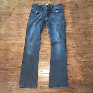 CAbi distressed size 6 boot cut jeans
